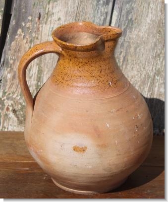 Never seen a glazed bottom !. Every Verwood jug is different....